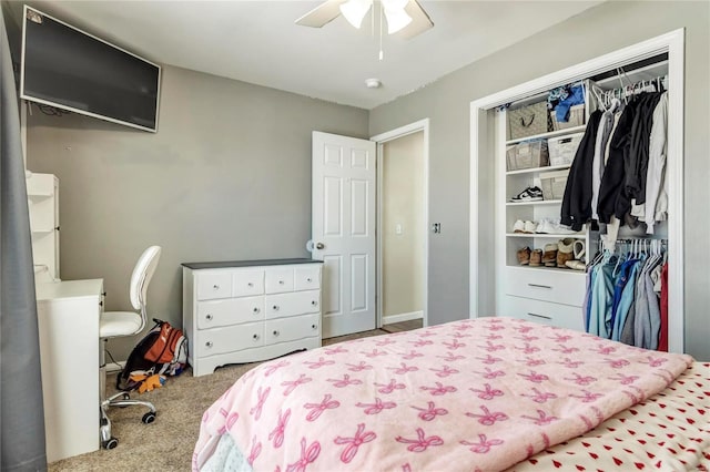 bedroom featuring carpet floors, a closet, and a ceiling fan