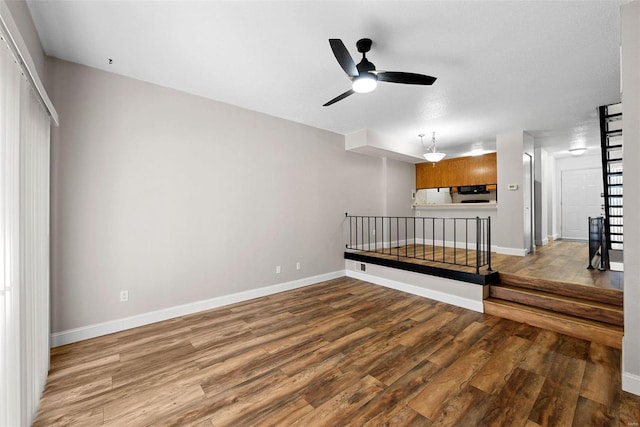 interior space featuring hardwood / wood-style flooring and ceiling fan