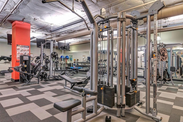 exercise room with carpet floors