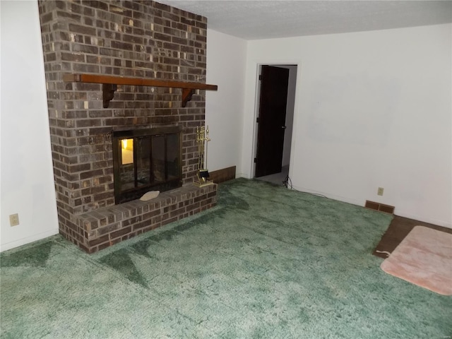 unfurnished living room with a fireplace and carpet flooring