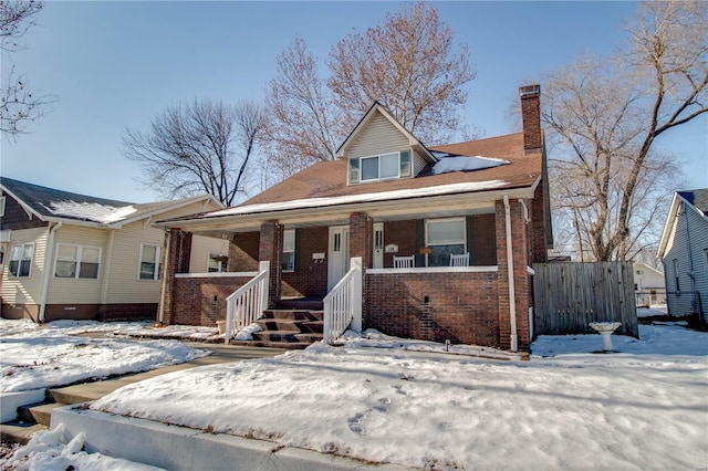 view of front of property featuring covered porch