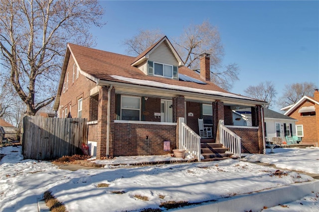 view of front of property featuring covered porch