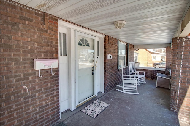 entrance to property with covered porch