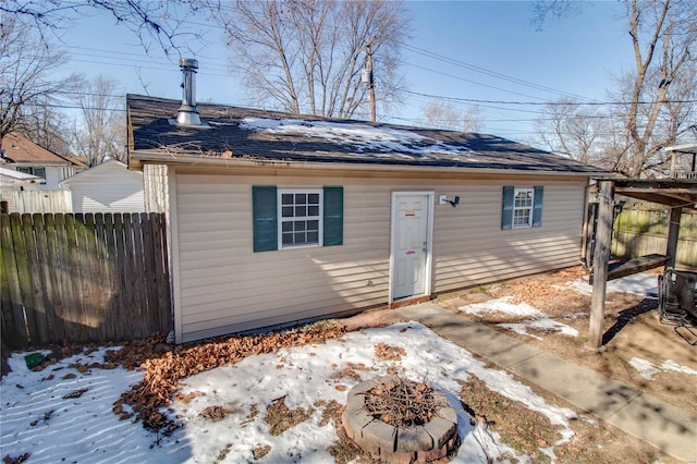 view of front of home with a fire pit