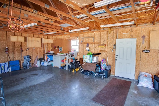 garage featuring a workshop area