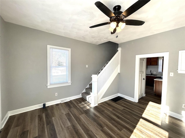 interior space featuring ceiling fan and wood-type flooring