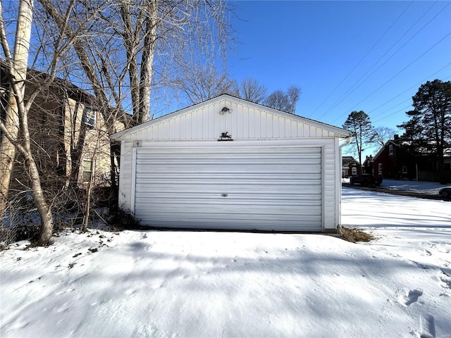 view of snow covered garage