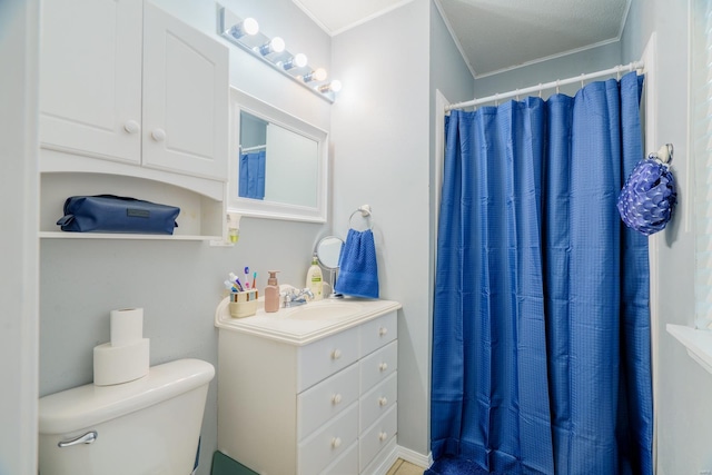 bathroom featuring toilet, vanity, crown molding, and curtained shower