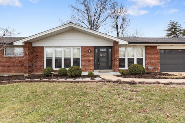 single story home with a garage and a front lawn