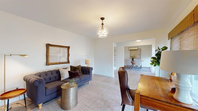 living room with light hardwood / wood-style flooring