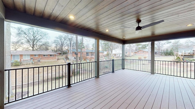 wooden deck with ceiling fan