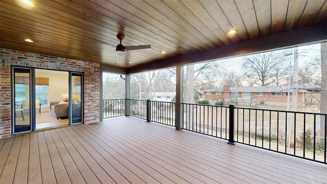 wooden deck with ceiling fan