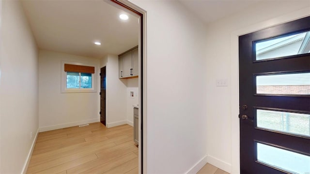 foyer entrance featuring light hardwood / wood-style flooring