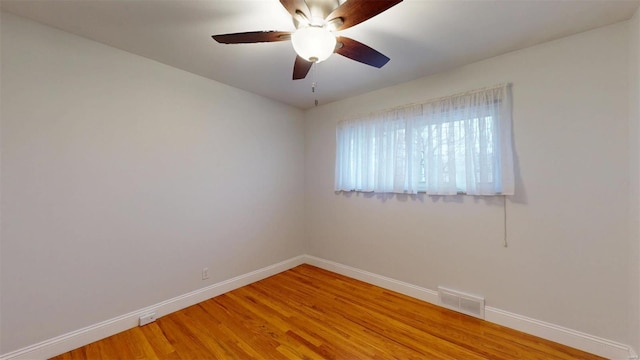 unfurnished room featuring hardwood / wood-style flooring and ceiling fan