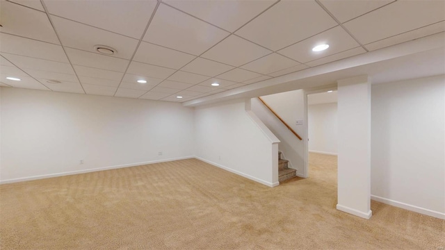 basement with light colored carpet