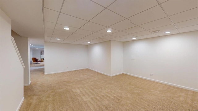 basement with light colored carpet