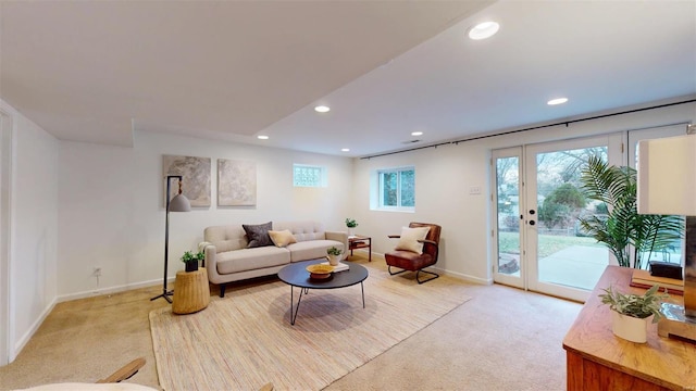 living room with light colored carpet and french doors