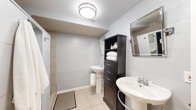 bathroom with tile patterned flooring