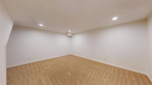 basement with light carpet