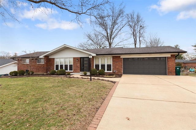 ranch-style home featuring a garage and a front yard