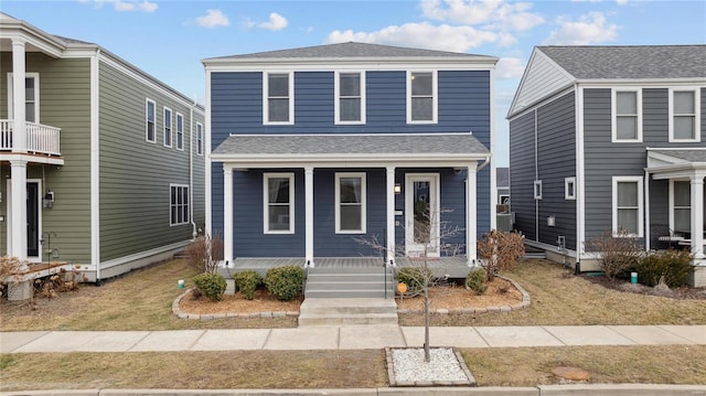 view of front of home featuring a porch and a shingled roof