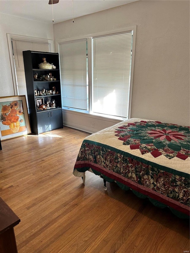 bedroom featuring light wood-type flooring