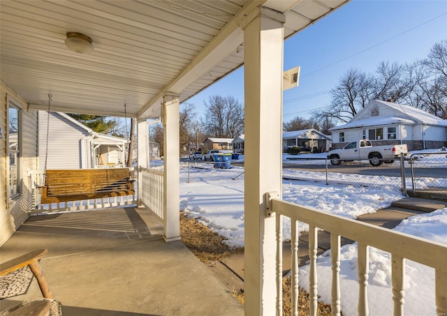 view of snow covered patio