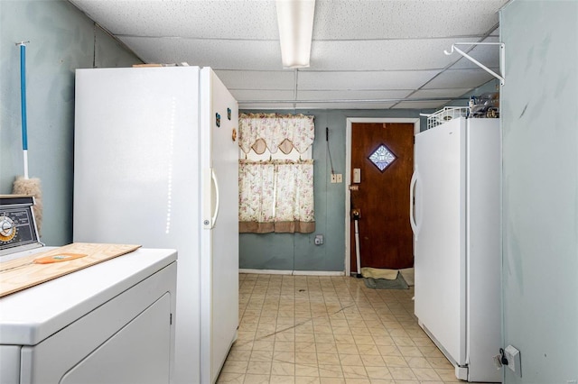 laundry area with washer / dryer