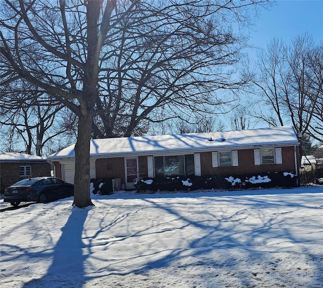 single story home featuring a garage