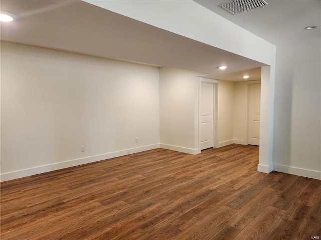 basement featuring dark wood-type flooring