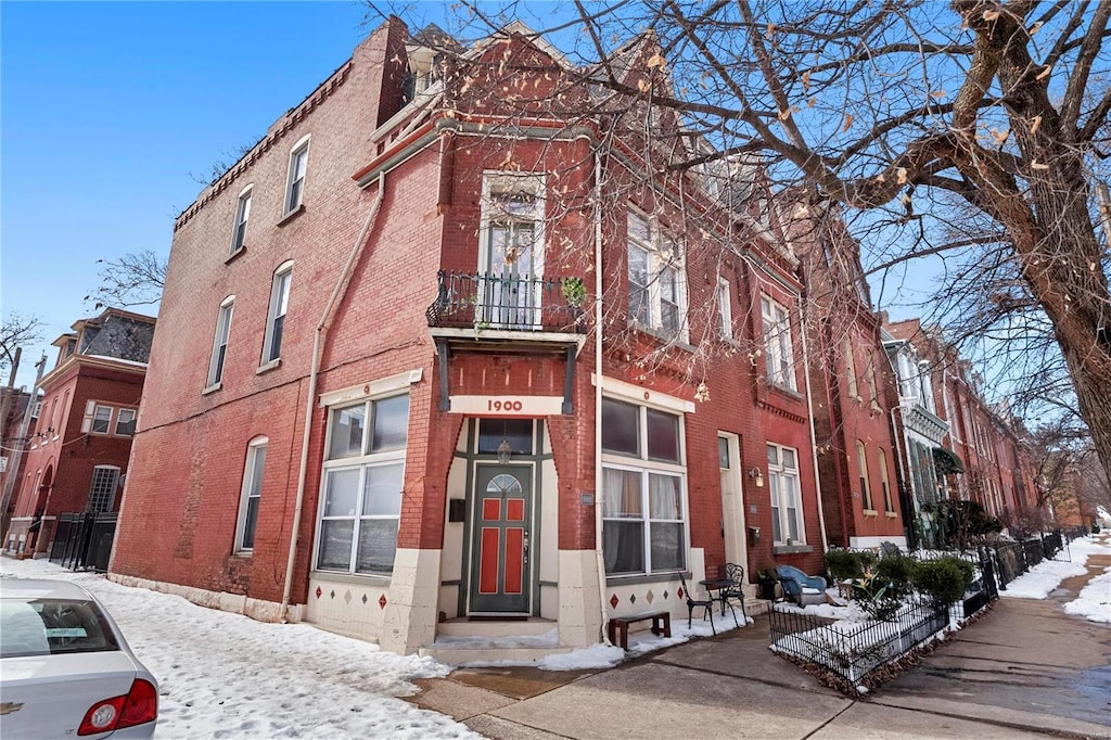 view of snow covered property