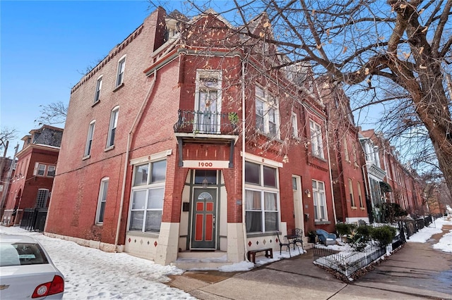 view of snow covered property