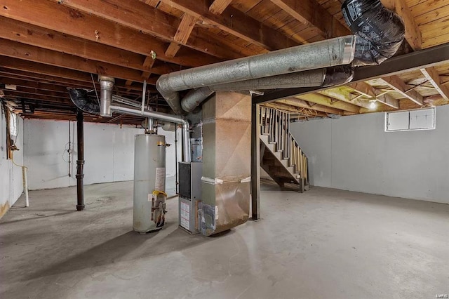 basement with heating unit and gas water heater