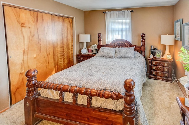 bedroom with a closet and carpet flooring