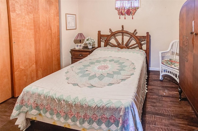 bedroom featuring dark hardwood / wood-style floors