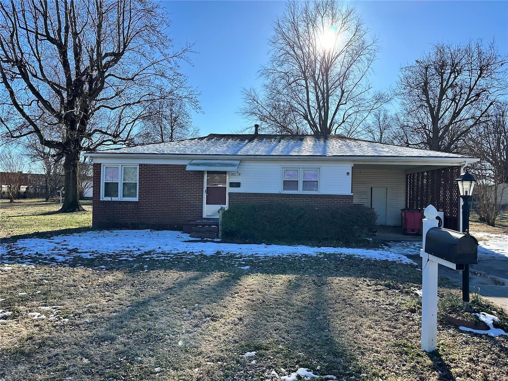 view of front of house with a carport