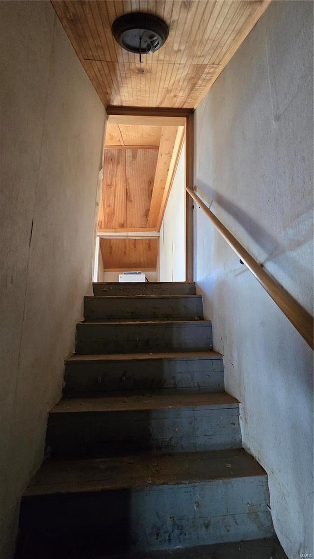 staircase featuring wooden ceiling