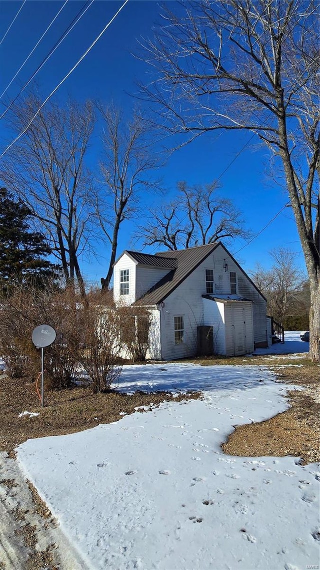 view of snow covered property