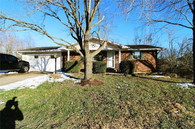 ranch-style home with a garage and a front lawn