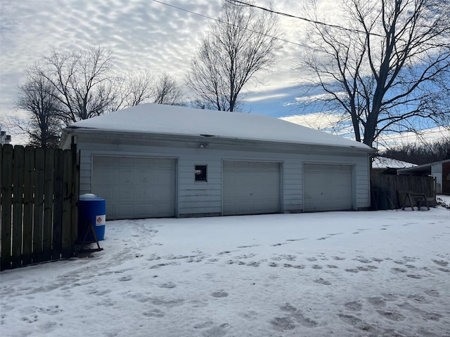 view of snow covered garage