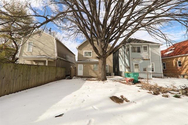 view of snow covered property