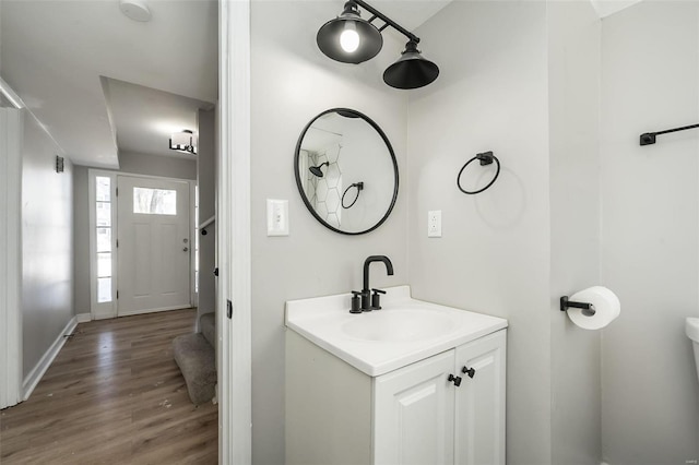 bathroom featuring vanity and wood-type flooring