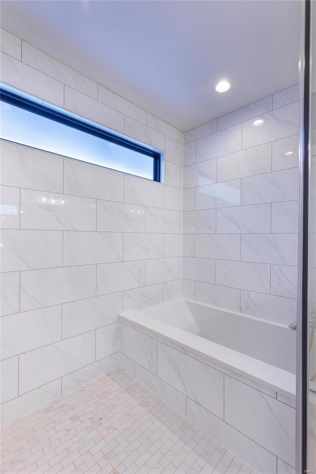 bathroom featuring independent shower and bath and tile patterned flooring