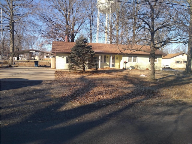 view of front of house featuring a carport