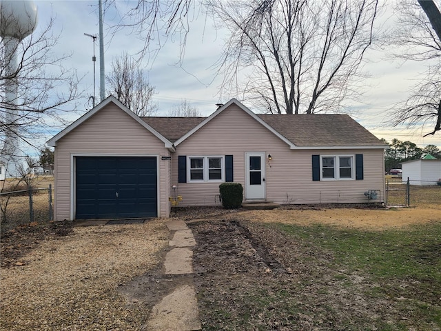 ranch-style home with a garage and a front yard