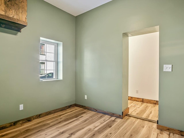 unfurnished room featuring light wood-type flooring