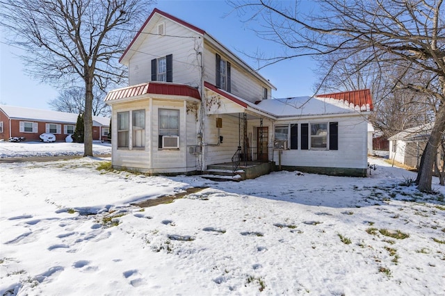 view of front of home featuring cooling unit