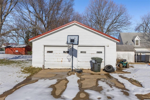 view of snow covered garage