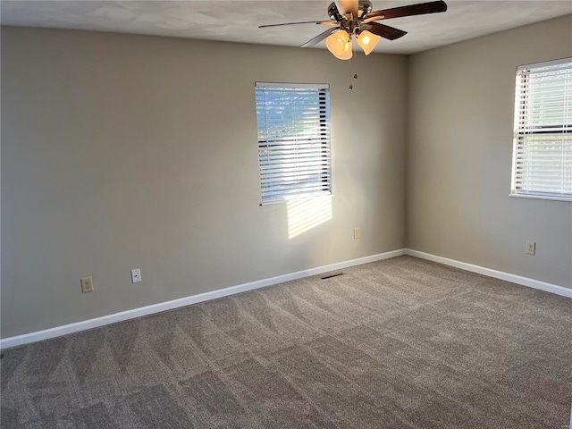 carpeted empty room with ceiling fan