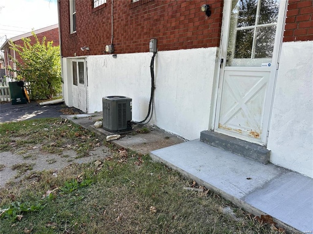 exterior space featuring cooling unit